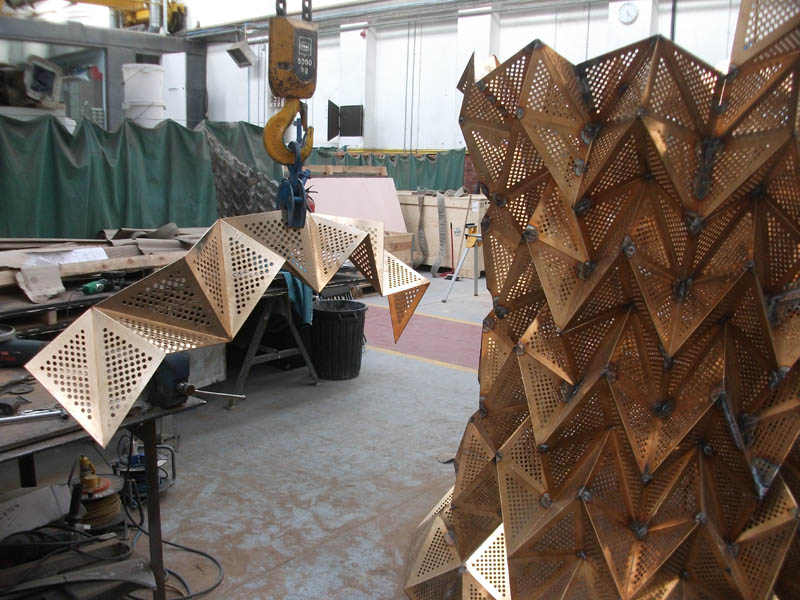 Folded section being added to Unfurl, at the National Sculpture Facory, Cork, Ireland. 2013
